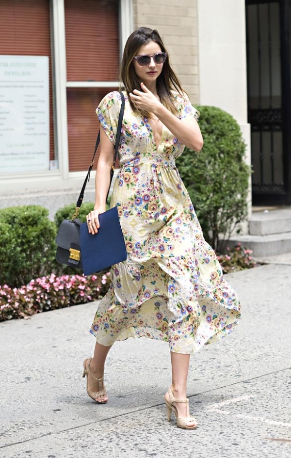 Miranda Kerr spotted in low-cut floral print dress with Miu Miu bag while exiting a medical building in NYC