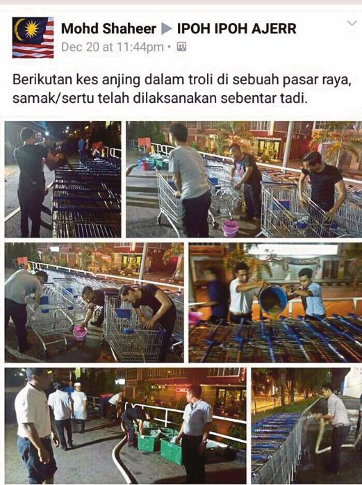 Kerja samak troli dilakukan selepas viral pelanggan membawa anjing ke pasar raya, baru-baru ini. Foto -Facebook Mohd Shaheer